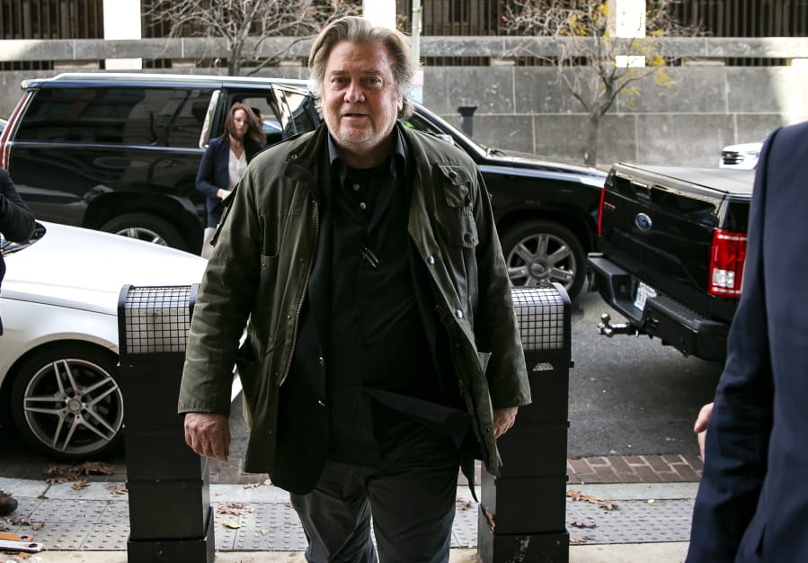 FILE - In this Nov. 8, 2019 file photo, former White House strategist Steve Bannon arrives to testify at the trial of Roger Stone, at federal court in Washington. Bannon was arrested Thursday, Aug. 20, 2020, on charges that he and three others ripped off donors to an online fundraising scheme &quot;We Build The Wall.&quot; The charges were contained in an indictment unsealed in Manhattan federal court.