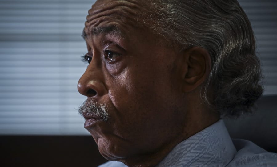 The Rev. Al Sharpton listens during an interview at his office, Thursday, July 30, 2020, in New York. For more than three decades, Sharpton, 65, has been an advocate for Black American families seeking justice in the wake of violence that highlight systemic racism.