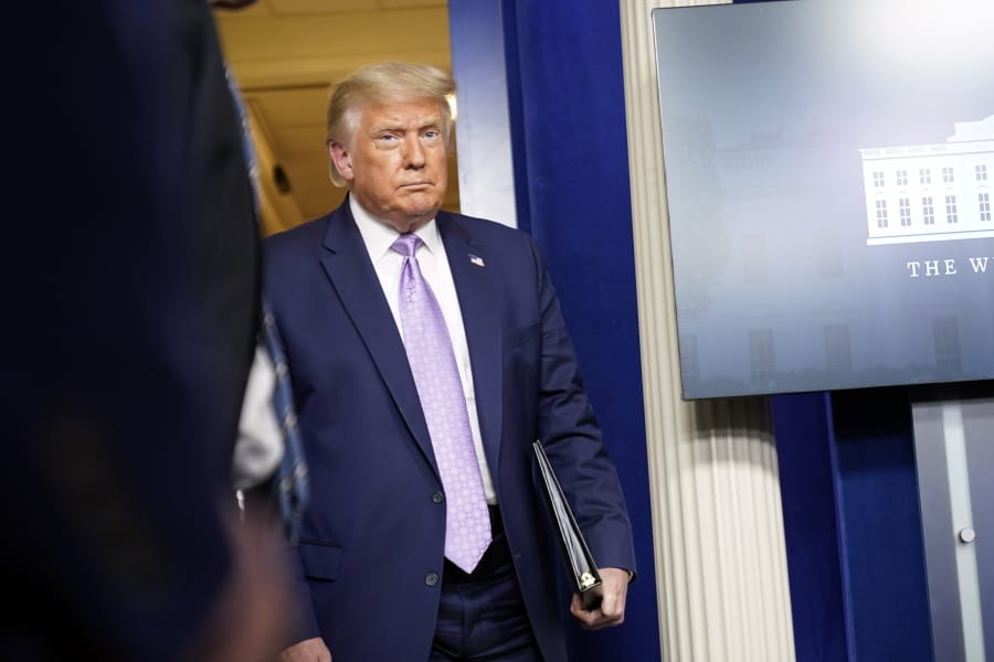 President Donald Trump arrives to speak at a news conference in the James Brady Press Briefing Room at the White House, Thursday, Aug. 13, 2020, in Washington.