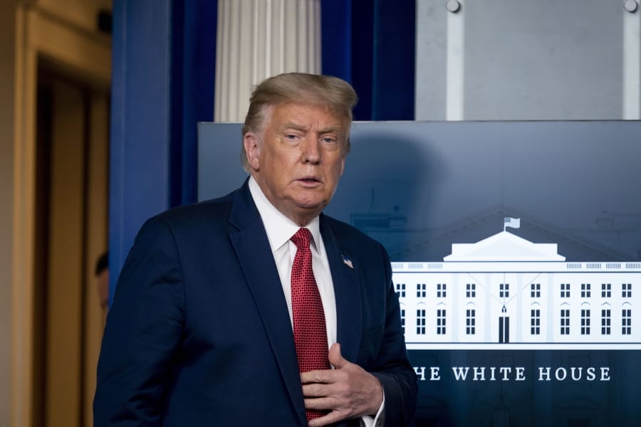 President Donald Trump arrives for a news conference in the James Brady Press Briefing Room at the White House, Monday, Aug. 10, 2020, in Washington.