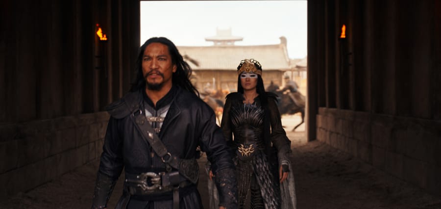 Jason Scott Lee, left, plays the villainous Bori Khan in &quot;Mulan.&quot; (Disney Enterprises)