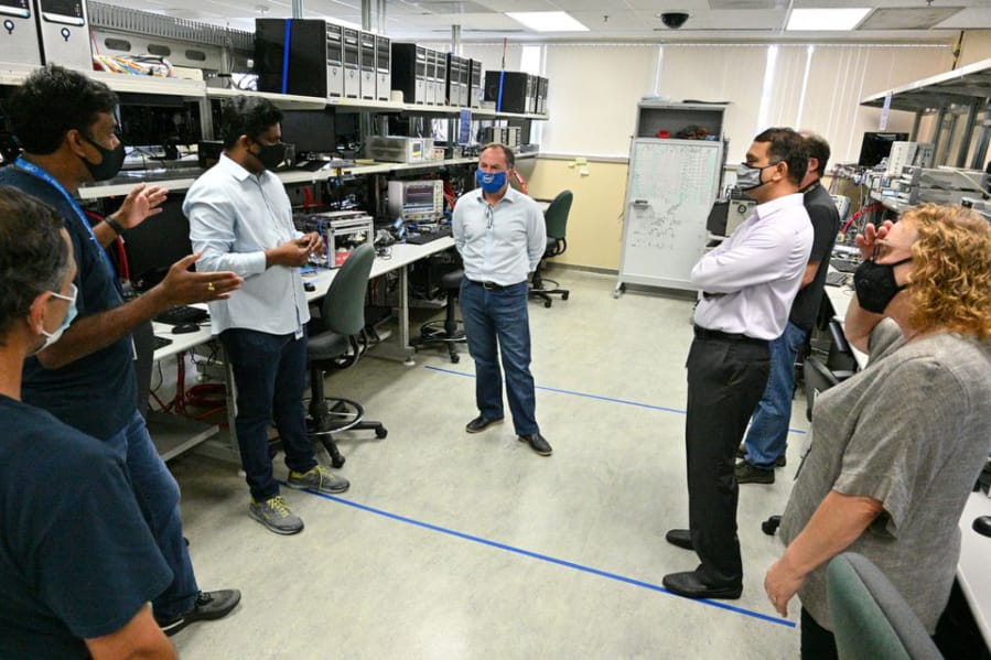 Intel CEO Bob Swan, center, inside one of the company&#039;s Oregon engineering labs.