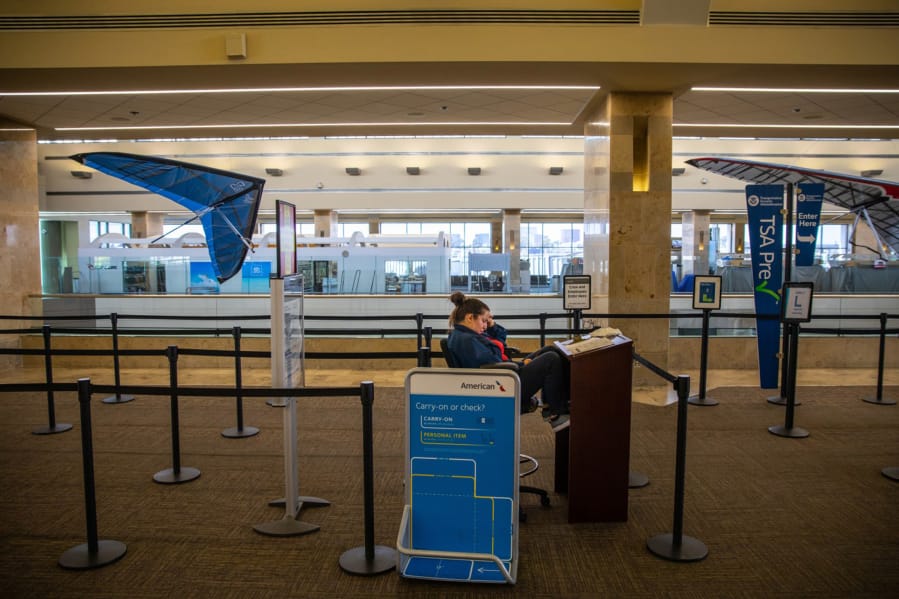TSA checkpoint at John Wayne Airport, near empty, on March 24, in Santa Ana, Calif. (Jay L.