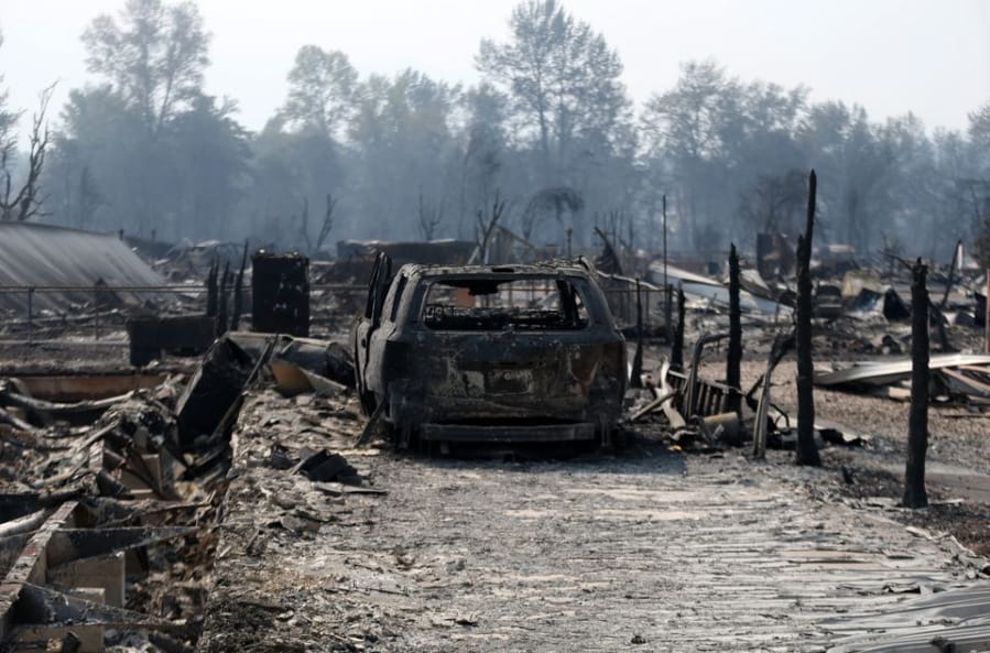 Destruction from the Almeda Fire is shown in Phoenix, Oregon. Thousands have been told to evacuate in southern Oregon as strong winds fed the fire.