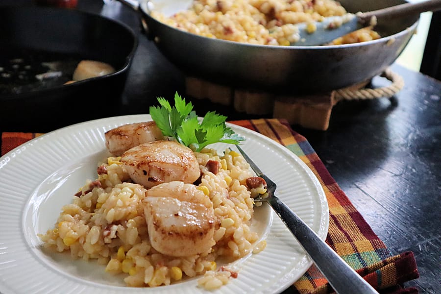 Seared scallops on top of corn and chorizo risotto is an easy and satisfying fall dish.