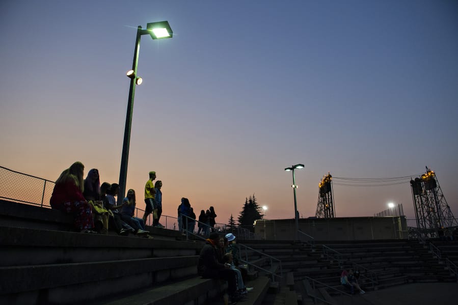Seniors from the class of 2021 at Hudson&#039;s Bay High School gather for &quot;senior sunrise&quot; at the Vancouver Waterfront amphitheater on Friday morning,. The students are not able to attend classes in person or have the senior sunrise on campus because of COVID-19 concerns.