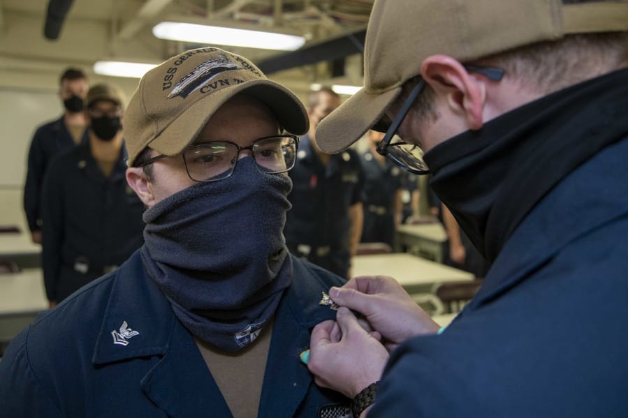 Electronics Technician (Nuclear) 1st Class Shaey Steele, from Vancouver, Washington, assigned to USS Gerald R. Ford&#039;s (CVN 78) reactor department, is pinned to his current rank during an awards at quarters ceremony, Sept. 12, 2020. Ford is underway in the Atlantic Ocean conducting carrier qualifications. (U.S.