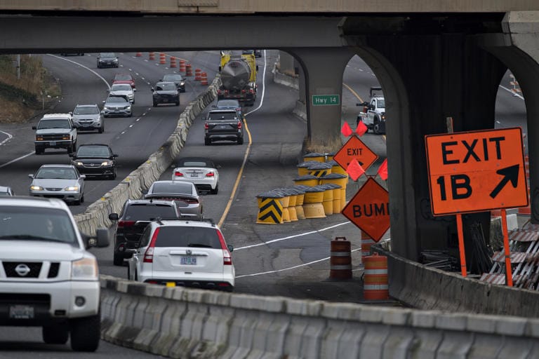 Motorists in the northbound lane of Interstate 5, right, navigate through an altered highway as they enter the Vancouver area Monday morning, Sept. 21, 2020.