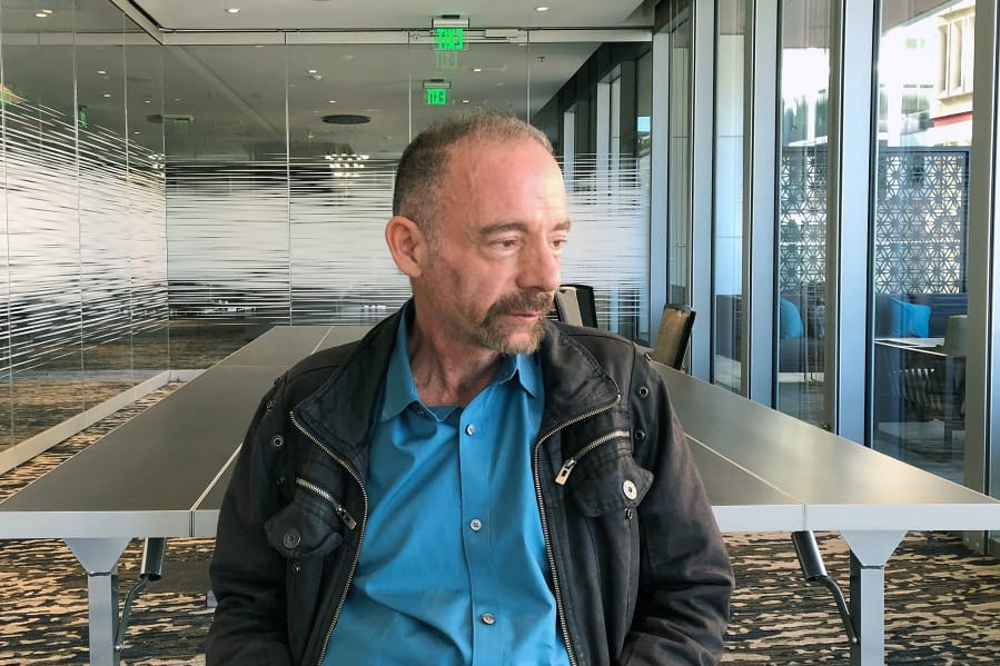 FILE - In this Monday, March 4, 2019 file photo, Timothy Ray Brown poses for a portrait in Seattle.  Brown, an American who was known for years as the Berlin patient, had a transplant in Germany from a donor with natural resistance to the AIDS virus. It was thought to have cured Brown&#039;s leukemia and HIV. But in an interview Thursday, Sept. 24, 2020, Brown said his cancer returned last year and has spread widely. His case has inspired scientists to seek more practical ways to try to cure the disease.