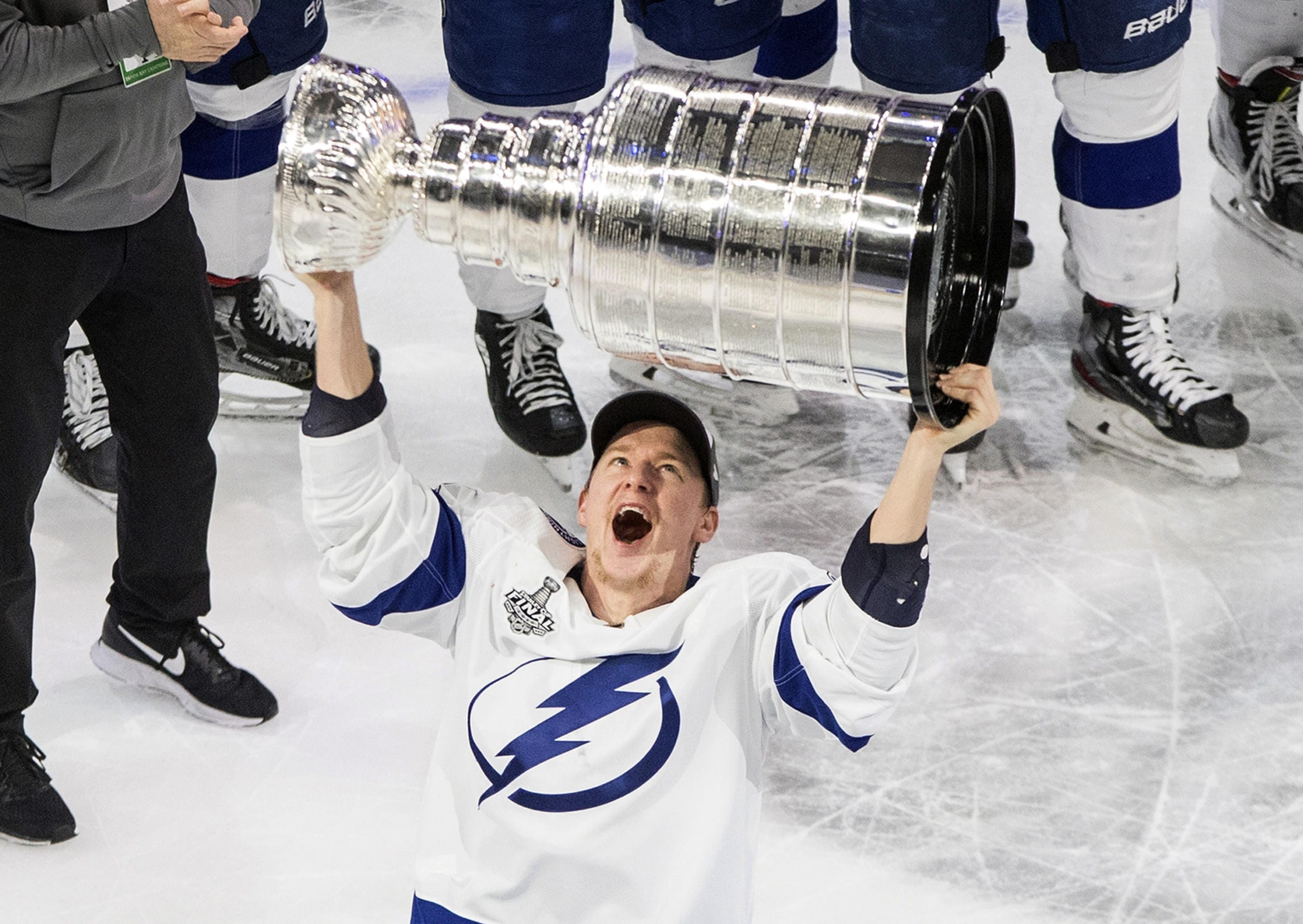 Tampa Bay Lightning's Ondrej Palat (18) hoists the Stanley Cup after defeating the Dallas Stars in Edmonton, Alberta, on Monday, Sept. 28, 2020.
