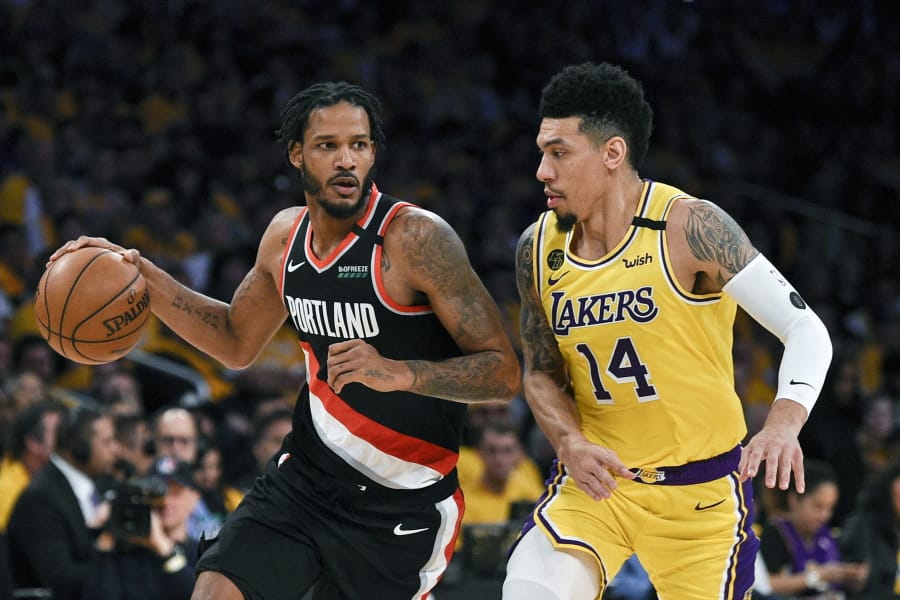 The Blazers&#039; Trevor Ariza, left, had a temporary restraining order issued against him, keeping the forward away from his 12-year-old son after the boy&#039;s mother alleged that Ariza had physically abused him.