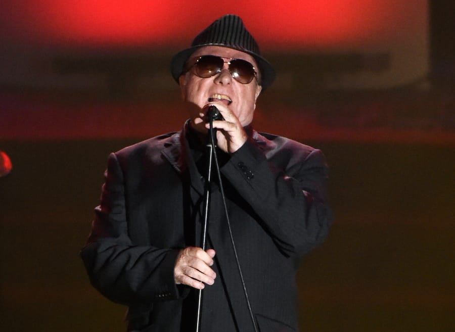 FILE - In this June 18, 2015 file photo, Van Morrison performs at the 46th annual Songwriters Hall of Fame Induction and Awards Gala in New York. Van Morrison is to release three new songs over the coming weeks that take a swipe at the lockdown restrictions imposed by the British government.