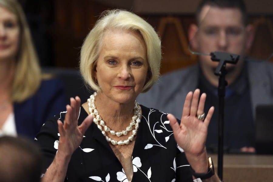 FILE - In this Jan. 13, 2020, file photo Cindy McCain, wife of former Arizona Sen. John McCain, waves to the crowd after being acknowledged by Arizona Republican Gov. Doug Ducey during his State of the State address on the opening day of the legislative session at the Capitol in Phoenix. Democratic presidential candidate former Vice President Joe Biden said Sept. 22 that Cindy McCain plans to endorse him for president. (AP Photo/Ross D.
