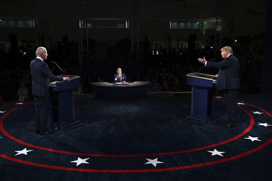 President Donald Trump and Democratic presidential candidate former Vice President Joe Biden participate in the first presidential debate Tuesday, Sept. 29, 2020, at Case Western University and Cleveland Clinic, in Cleveland, Ohio.