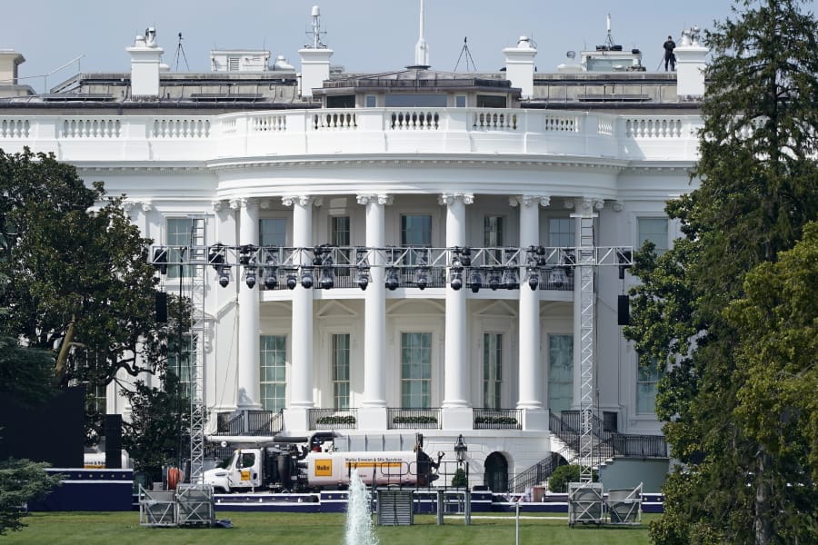 FILE - In this Aug. 21, 2020, file photo lights and staging stand on the South Lawn of the White House, Friday, Aug. 21, 2020, in Washington. President Donald Trump is expected to speak to the Republican National Committee convention next week from the South Lawn of the White House.