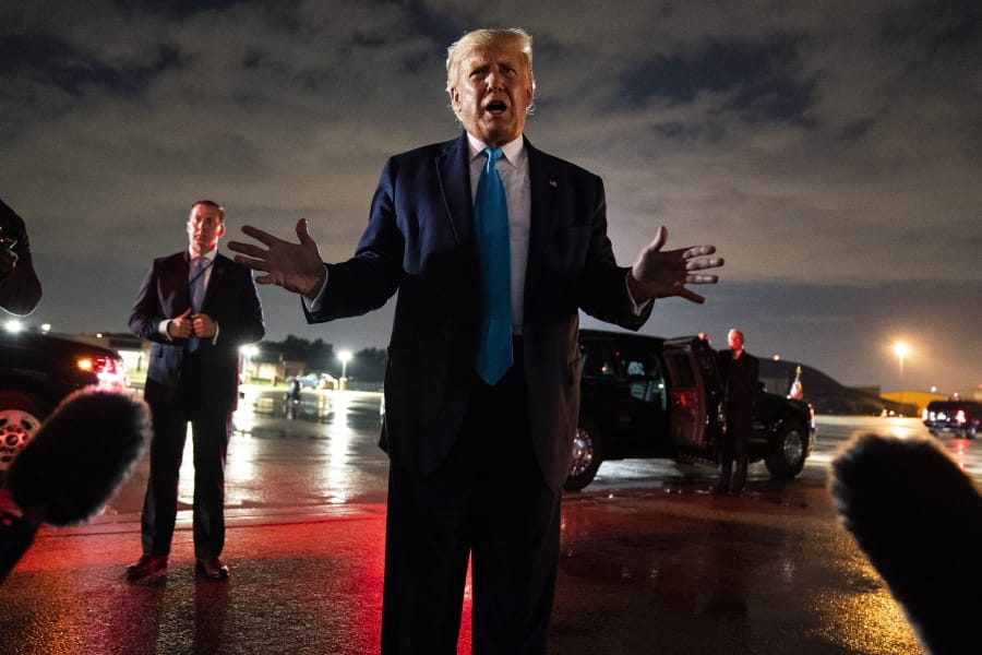 President Donald Trump talks with reporters at Andrews Air Force Base after attending a campaign rally in Latrobe, Pa., Thursday, Sept. 3, 2020, at Andrews Air Force Base, Md.