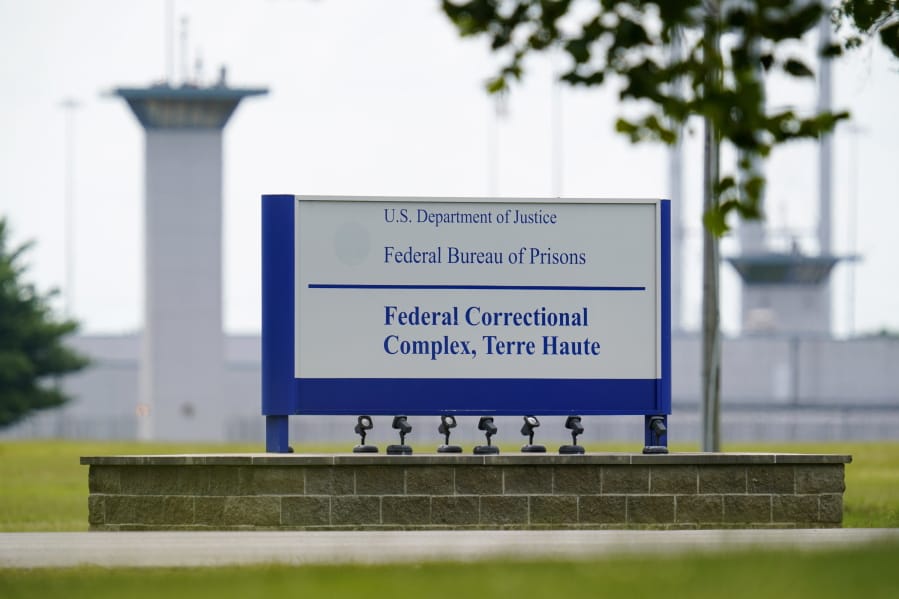 FILE - In this Aug. 28, 2020, file photo shows the federal prison complex in Terre Haute, Ind. A wave of federal executions by the Trump administration after a 17-year hiatus are set to resume. If it goes ahead as scheduled Tuesday, Sept. 22, 2020, William Emmett LeCroy would be the sixth federal death-row inmate executed this year at the U.S. prison in Terre Haute, Indiana. Another is scheduled Thursday.