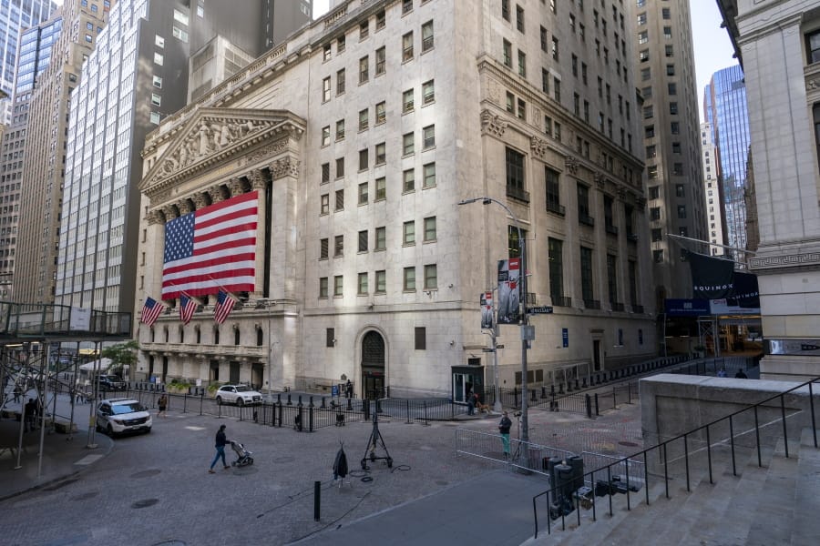 A giant American Flag hangs on the New York Stock Exchange, Monday, Sept. 21, 2020.  U.S. stock indexes are mixed in early trading Wednesday, as Wall Street&#039;s tumultuous month continues to churn.