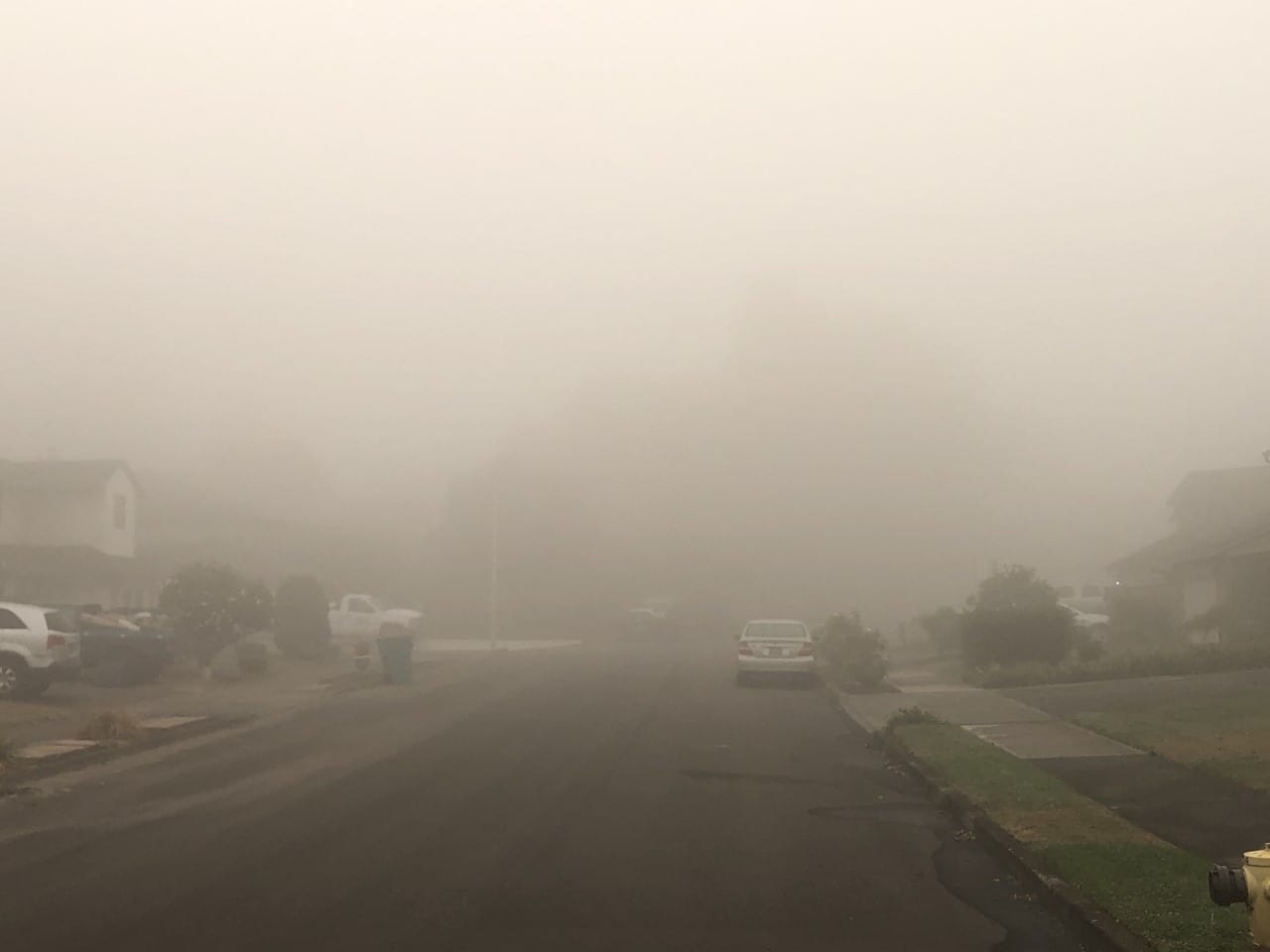 Dense fog and wildfire smoke clouded the air in Clark County on Sunday morning, leading to multiple alerts from the National Weather Service.