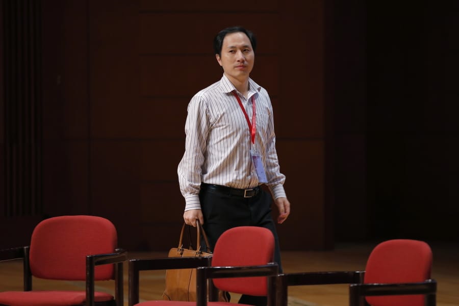 FILE - In this Wednesday, Nov. 28, 2018 file photo, genetic researcher He Jiankui arrives for the Human Genome Editing Conference in Hong Kong.