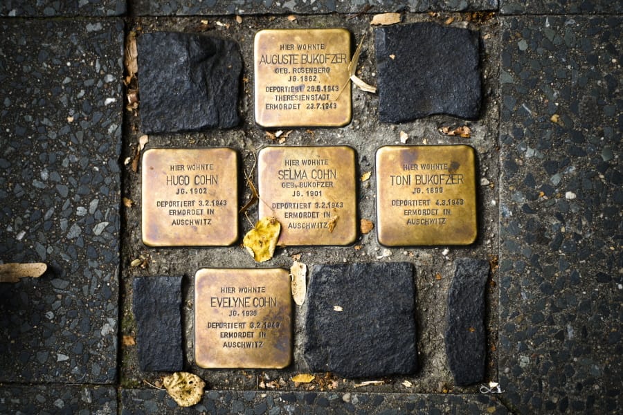 So called stumbling blocks, marking the last voluntarily chosen places of residence of the victims of the Nazis, are embedded in the pavement in Berlin, Germany, Wednesday, Sept. 9, 2020. The Department for Research and Information on Anti-Semitism Berlin, or RIAS documented 410 incidents in Berlin, more than two a day, in the first half of 2020, including physical attacks, property damage, threats, harmful behavior and anti-Semitic propaganda.