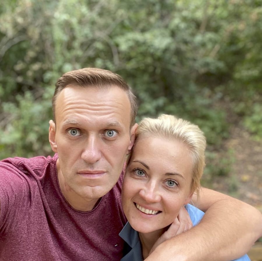In this photo published by Russian opposition leader Alexei Navalny on his instagram account on Friday, Sept. 25, 2020, Russian opposition leader Alexei Navalny and his wife Yulia pose for a selfie in an unknown location in Germany. This week Navalny was discharged from a Berlin hospital after being treated for what German authorities determined to be nerve agent poisoning. In an Instagram post on Friday, the politician thanked Russian pilots for landing the plane after he collapsed into a coma on Aug.
