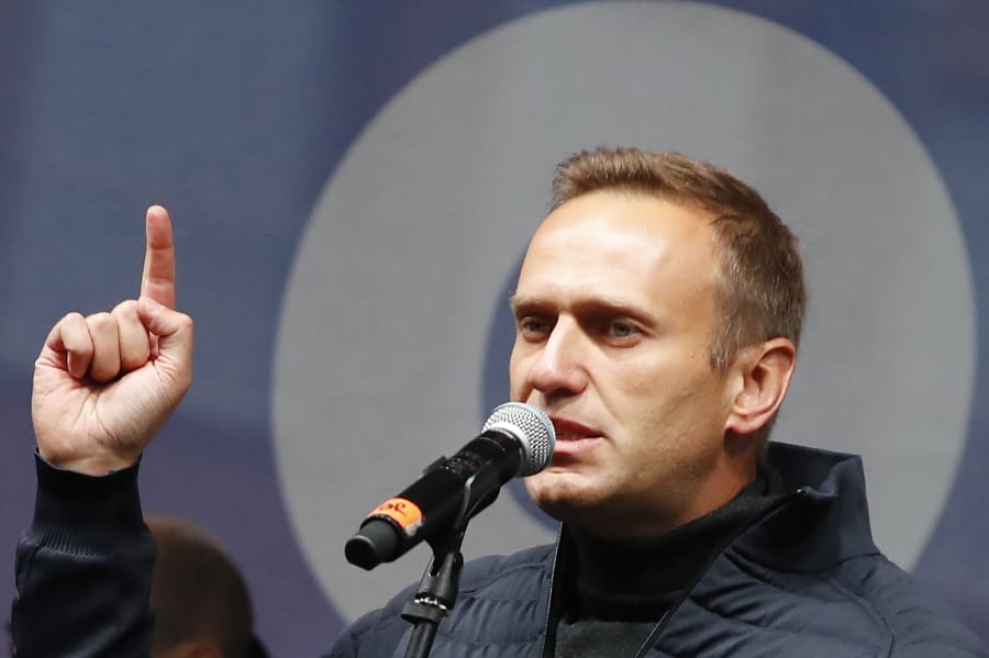FILE - In this Sunday, Sept. 29, 2019 file photo Russian opposition leader Alexei Navalny speaks during a rally to support political prisoners in Moscow, Russia. The German hospital treating Russian opposition leader Alexei Navalny says he has been taking out of an induced coma and is responsive. Berlin&#039;s Charite hospital said Monday that Navalny&#039;s condition has further improved, allowing doctors to end the medically induced coma and gradually ease him off mechanical ventilation.