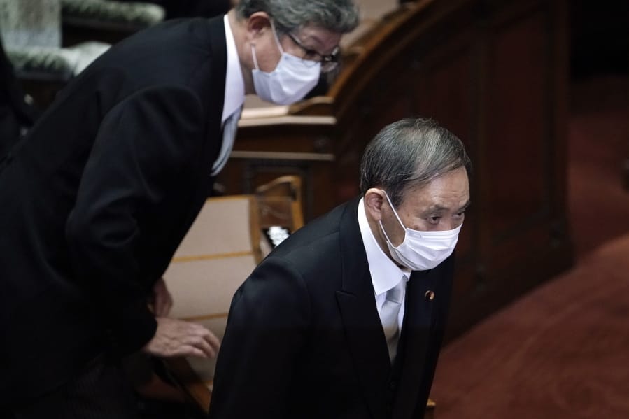 Japan&#039;s new Prime Minister Yoshihide Suga attends an extraordinary session at the upper house of parliament Thursday, Sept. 17, 2020, in Tokyo. Suga started his first full day in office Thursday, with a resolve to push for reforms for the people, and he said he is already taking a crack at it.