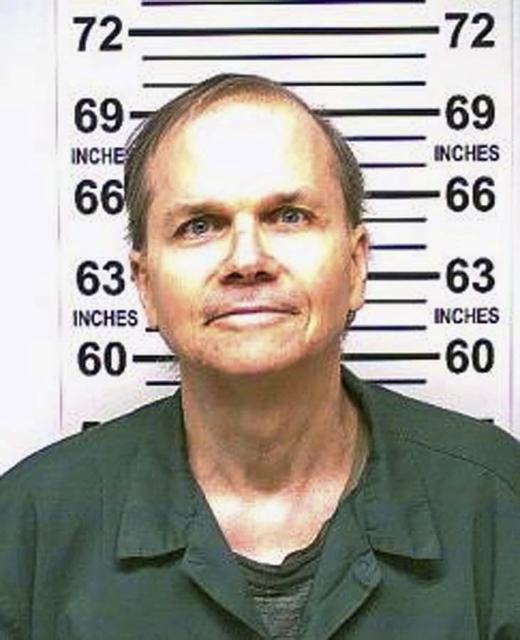 FILE -  This Jan. 31, 2018 photo, provided by the New York State Department of Corrections, shows Mark David Chapman, the man who killed John Lennon outside his Manhattan apartment in 1980. Chapman said he was seeking glory and deserved the death penalty for the &quot;despicable&quot; act. Chapman made the comments in response to questions last month from a parole board, which denied him parole for an 11th time.