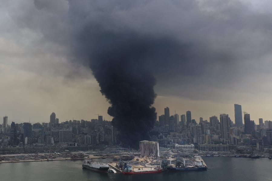 Black smoke rises from a fire at warehouses at the seaport of Beirut, Lebanon, Thursday, Sept. 10. 2020. A huge fire broke out Thursday at the Port of Beirut, triggering panic among residents traumatized by last month&#039;s massive explosion that killed and injured thousands of people.