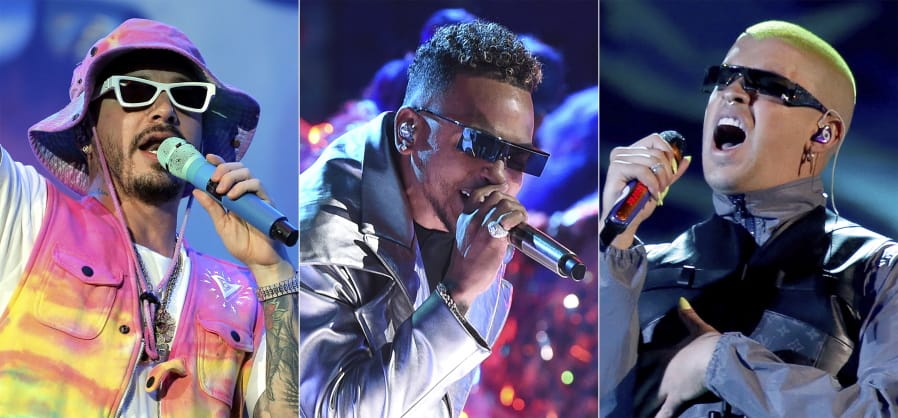 J Balvin performs during the Coca-Cola Flow Reggaeton festival in Mexico City on Nov. 23, 2019, from left, Ozuna performs at the Latin American Music Awards in Los Angeles on Oct. 17, 2019 and Bad Bunny performs a medley at the Billboard Latin Music Awards in Las Vegas on April 25, 2019. Balvin scored a whopping 13 nominations at the 2020 Latin Grammys, including two nominations for album of the year and two for record of the year. The Latin Academy announced Tuesday that Bad Bunny and Ozuna are behind Balvin with nine and eight nominations, respectively.