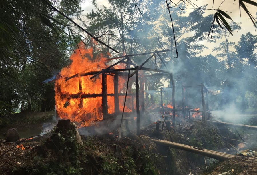 Houses burn on Sept. 7, 2017, in Gawdu Zara village, northern Rakhine state, Myanmar.