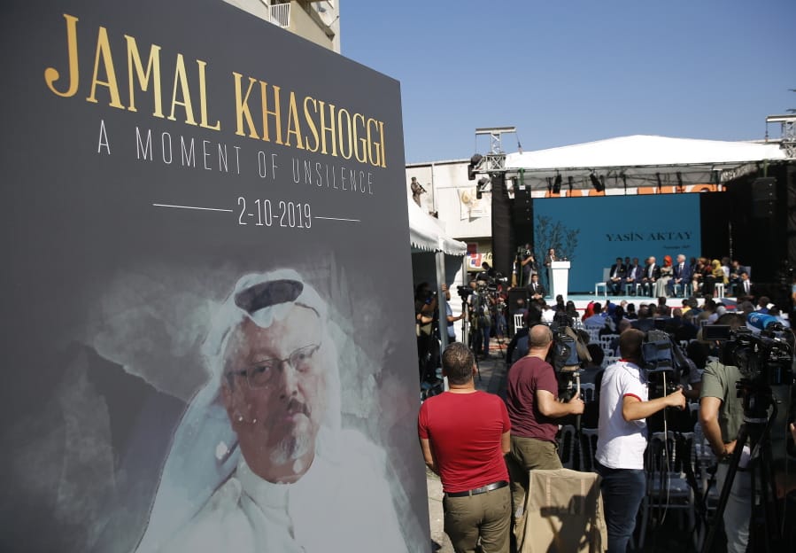 FILE - In this Oct. 2, 2019 file photo, a picture of slain Saudi journalist Jamal Kashoggi, is displayed during a ceremony near the Saudi Arabia consulate in Istanbul, marking the one-year anniversary of his death. Saudi Arabia&#039;s state television says final verdicts have been issued in the case of slain Washington Post columnist and Saudi critic Jamal Khashoggi after his family announced pardons that spared five from execution. The Riyadh Criminal Court issued final verdicts Monday, Sept. 7, 2020, against eight people. The court ordered a maximum sentence of 20 years in prison for five, with one receiving a 10-year sentence and two others being ordered to serve seven years in prison. The trial was widely criticized by rights groups and an independent U.N. investigator, who noted that no senior officials nor anyone suspected of ordering the killing was found guilty.