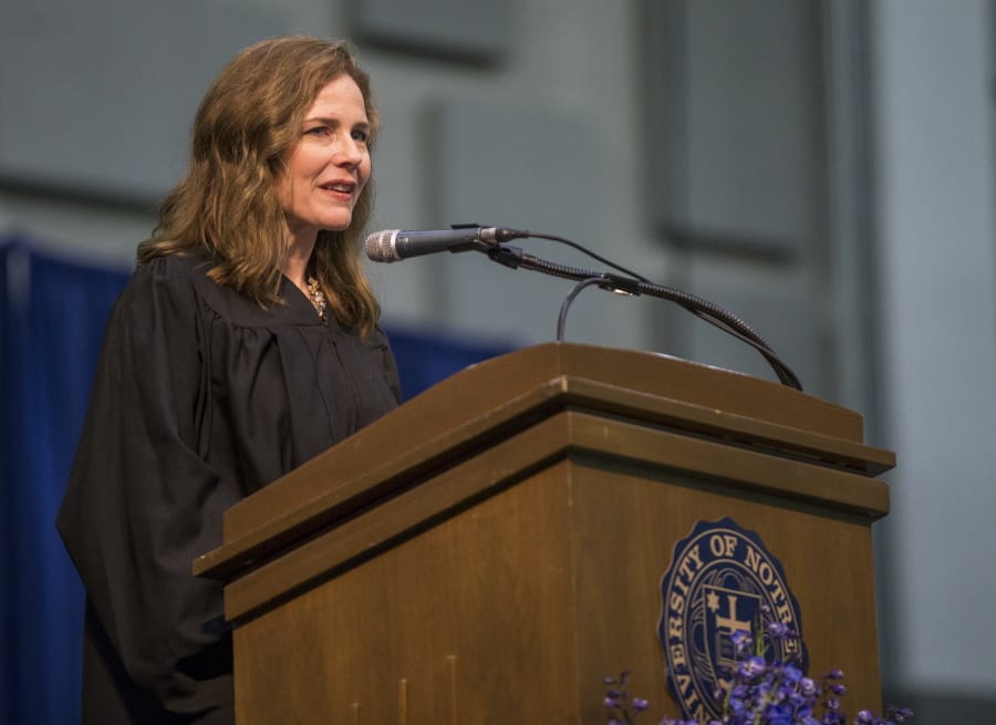 FILE - In this May 19, 2018, file photo, Amy Coney Barrett, United States Court of Appeals for the Seventh Circuit judge, speaks during the University of Notre Dame&#039;s Law School commencement ceremony at the university, in South Bend, Ind. Barrett, a front-runner to fill the Supreme Court seat vacated by the death of Justice Ruth Bader Ginsburg, has established herself as a reliable conservative on hot-button legal issues from abortion to gun control.