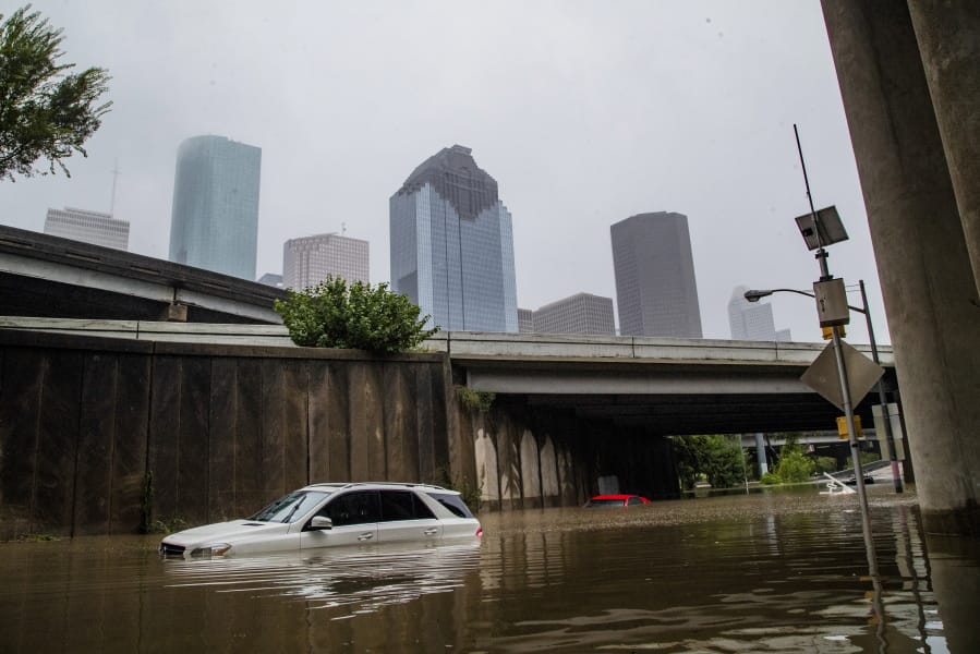 Cars get stranded on high flood waters on Houston Ave. exit from Interstate 45 during Tropical Storm Beta Tuesday, Sept. 22, 2020, in Houston. (Marie D.
