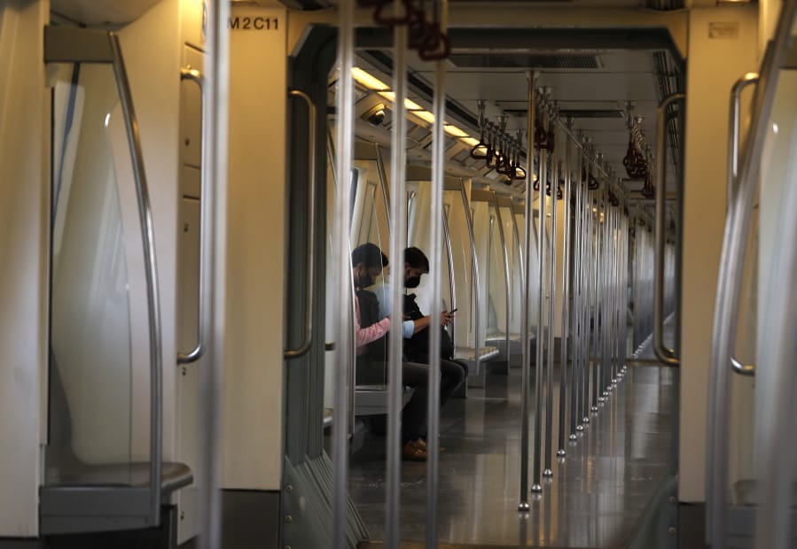Commuters travel in an almost empty Delhi metro train in New Delhi, India, Monday, Sept. 7, 2020. India&#039;s coronavirus cases are now the second-highest in the world and only behind the United States, as the caseload crosses Brazil on a day when urban metro trains partially resume service in the capital New Delhi and other states.