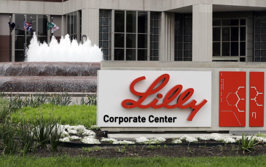 FILE - The Eli Lilly corporate headquarters is pictured April 26, 2017, in Indianapolis. A drug company says that adding an anti-inflammatory medicine to a drug already widely used for hospitalized COVID-19 patients shortens their time to recovery by an additional day. Eli Lilly announced the results Monday, Sept. 14, 2020, from a 1,000-person study sponsored by the U.S. National Institute of Allergy and Infectious Diseases.