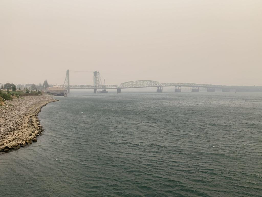 Wildfire smoke settles in around the Interstate 5 Bridge late Wednesday. Air quality conditions are rated as unhealthy throughout Southwest Washington.