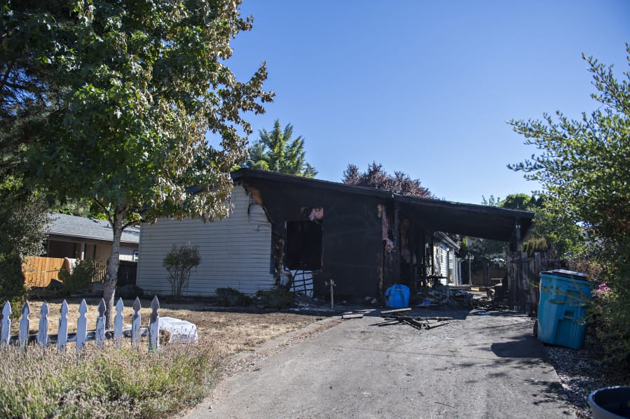 Two people were killed in a fire that consumed the residence at 6901 N.E. 149th Court in the Sifton area on Sept. 1, as seen the next morning.