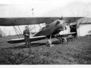 Basil Dhanens is shown with a biplane in 1931 that he probably built in his garage near today&#039;s Highway 99 and 78th Street. He was also a one-man water department and airport operator. A Belgian immigrant, pilot, weatherman and entrepreneur, he was so popular that Hazel Dell almost changed its name to Basilville.