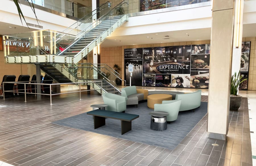 Concept renderings show some of the new furniture that will be added to the Vancouver Mall promenade during an upcoming remodel. The future entrance to a Round1 entertainment venue can be seen in the background.