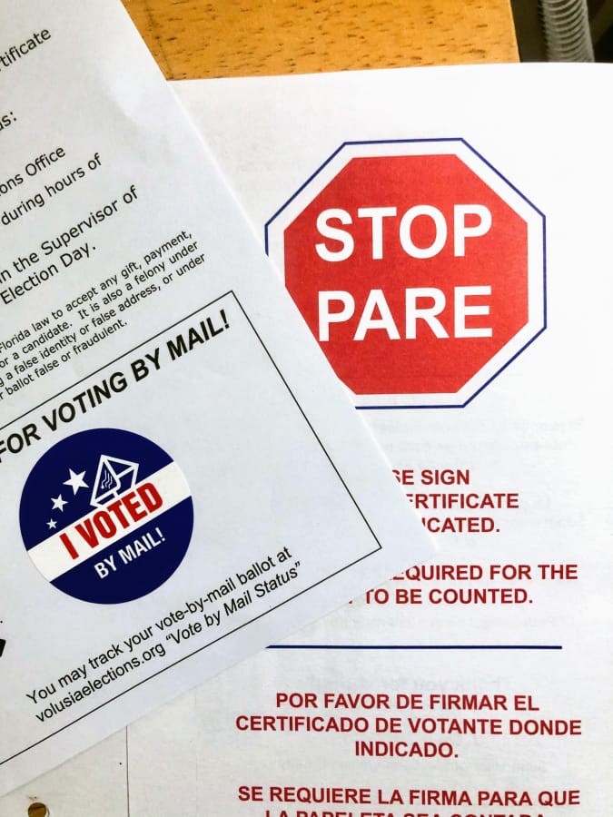 Vote-by-mail instructions with an &amp;#34;I voted&amp;#34; sticker included in the kit.