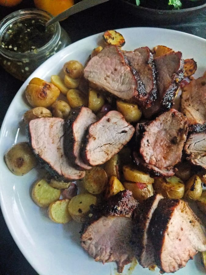 Pork roast is dusted in warm Mediterranean spices and glazed with homemade, spicy-sweet jalapeno jelly.
