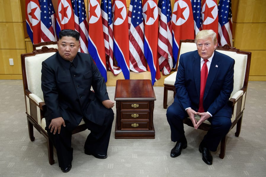North Korea&#039;s Kim Jong Un, left, and President Donald Trump meet on the south side of the Military Demarcation Line that divides North and South Korea, in the Joint Security Area of Panmunjom in the Demilitarized Zone on June 30, 2019.