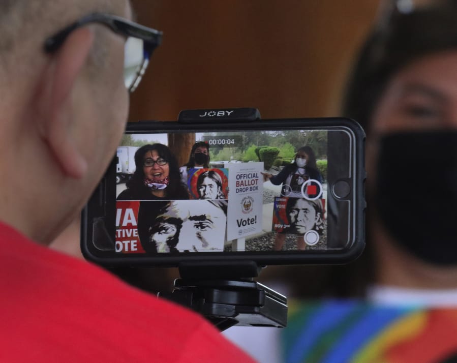 Lummi tribal members record a public service announcement about getting out the Native vote on October 7, 2020, north of Bellingham, Washington.