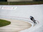 Vancouver native McKenna McKee, 17, rides the inner bank of the Alpenrose Velodrome in Portland. The steep banks can be terrifying at first, McKee says, but now that fear is what keeps her going.