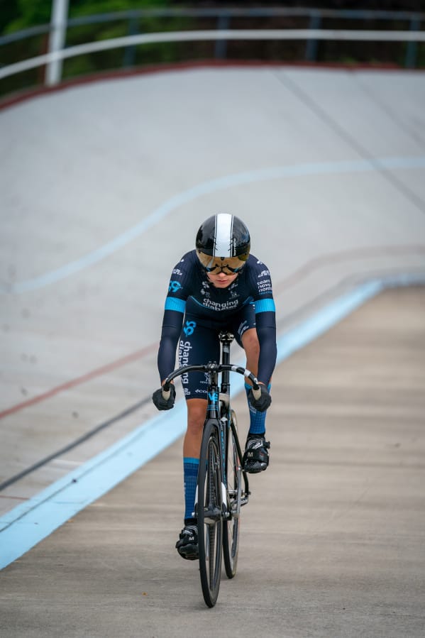 Vancouver native McKenna McKee rides her bike at the Alpenrose Velodrome in Portland. Track cycling is a grueling sport where riders compete in short races inside a steeply banked oval, called a velodrome.