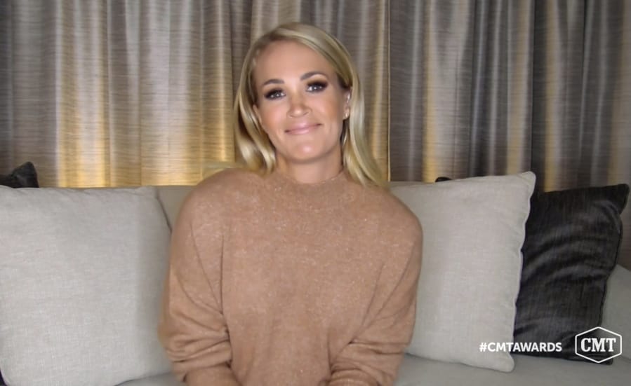 In this video image provided by CMT, Carrie Underwood accepts the female of the year award for &quot;Drinking Alone&quot; during the Country Music Television awards airing on Wednesday, Oct. 21, 2020.
