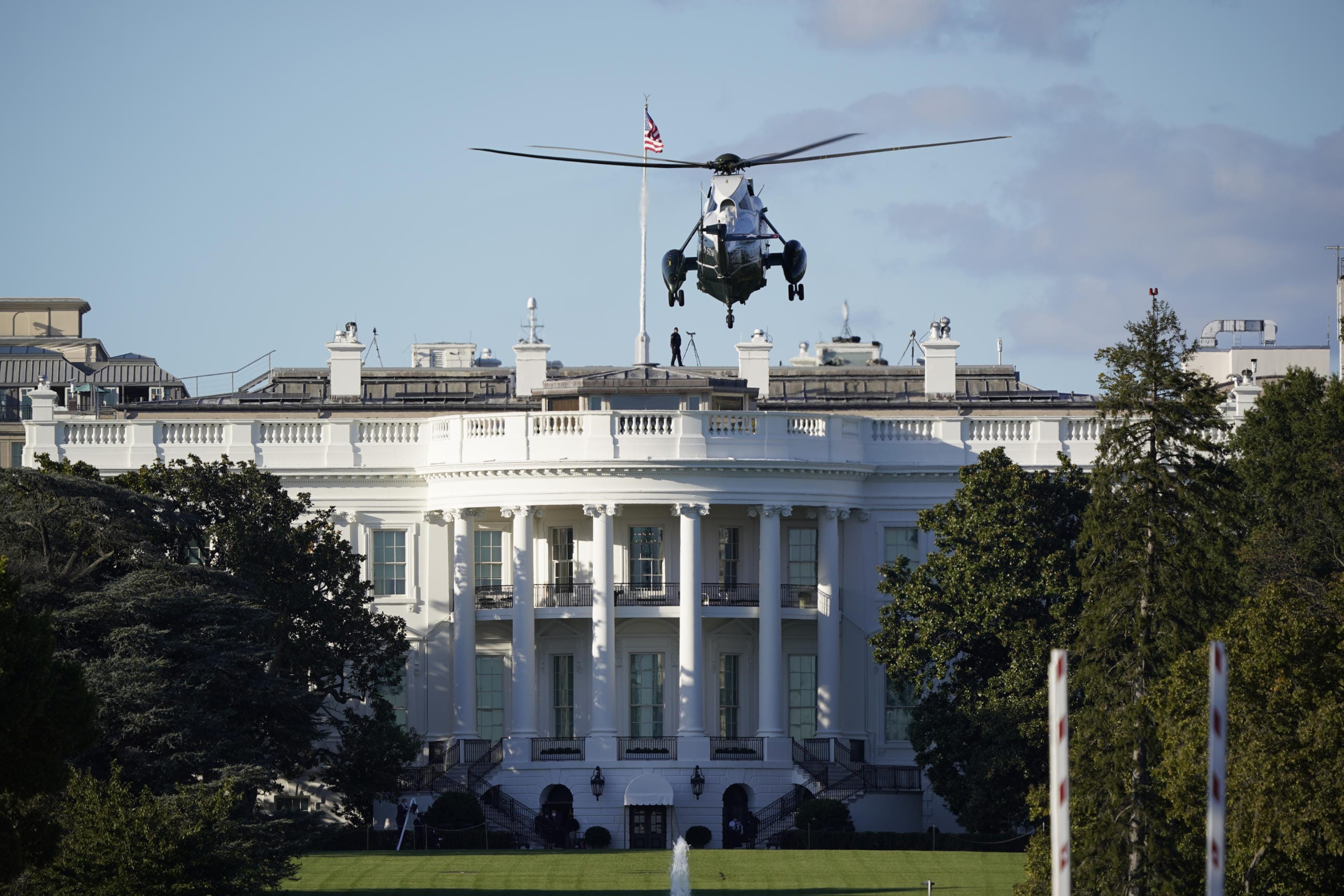 The helicopter that will carry President Donald Trump to Walter Reed National Military Medical Center in Bethesda, Md., lands on the South Lawn of White House in Washington, Friday, Oct. 2, 2020. The White House says Trump will spend a "few days" at the military hospital after contracting COVID-19. (AP Photo/J.