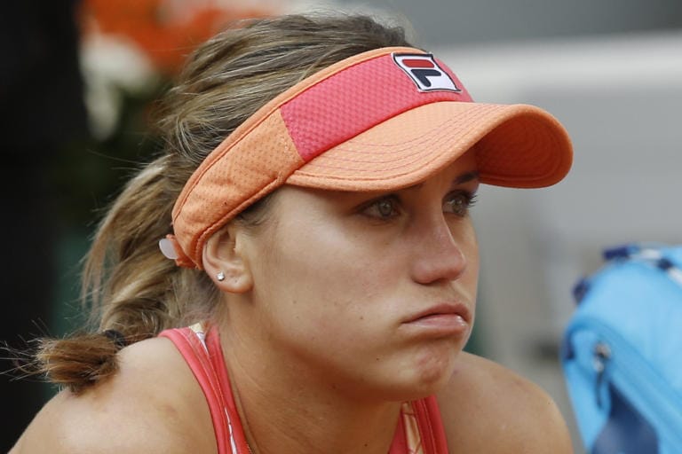 Sofia Kenin of the U.S. reacts to losing the final of the French Open tennis tournament against Poland's Iga Swiatek at the Roland Garros stadium in Paris, France, Saturday, Oct. 10, 2020.